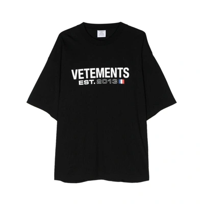 Shop Vetements Logo Printed Oversized T-shirt In Nero