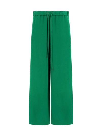 Shop Valentino Pants In Pure Green