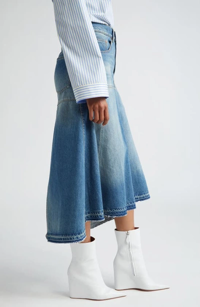 Shop Victoria Beckham Deconstructed Cotton Denim Skirt In Vintage Wash Mid