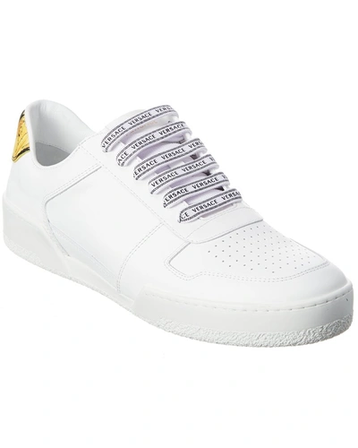 Shop Versace Leather Sneaker In White