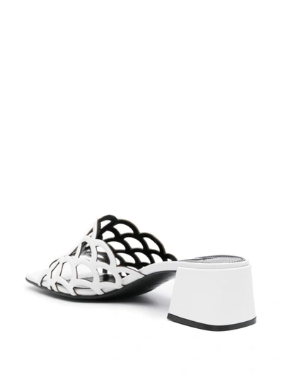 Sergio Rossi Low Block Heel Mules With Openwork Detail In White