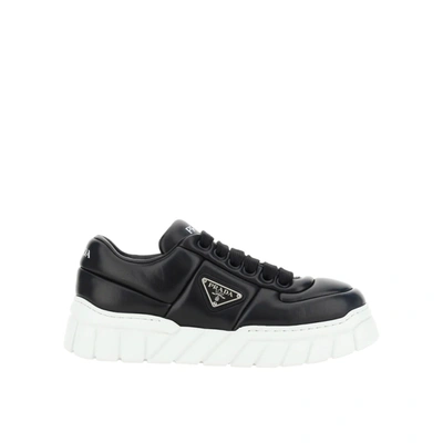 Shop Prada Leather Padded Sneaker In Black