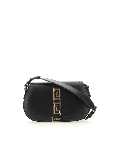 Shop Versace Greca Fold-over Crossbody Bag