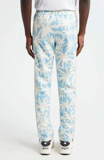 Shop Palm Angels Palm Print Track Pants In Light Blue Of