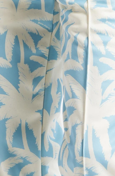 Shop Palm Angels Palm Print Track Pants In Light Blue Of
