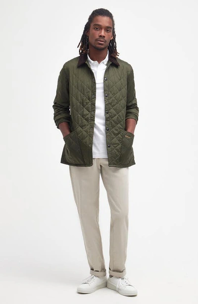 Barbour Heritage Liddesdale Green Jacket With Classic Corduroy Collar And Logo Lettering On The Front In Tec