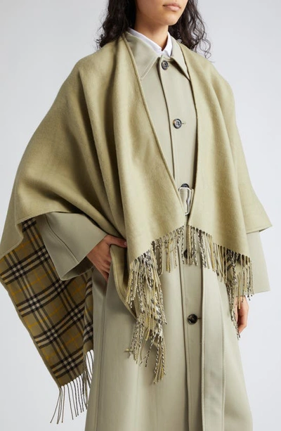 Shop Burberry Fringed Wool Reversible Cape In Hunter