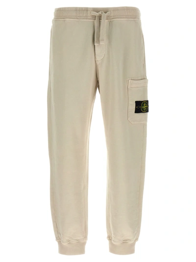 Shop Stone Island Compass Patch Cotton Track Pants In White