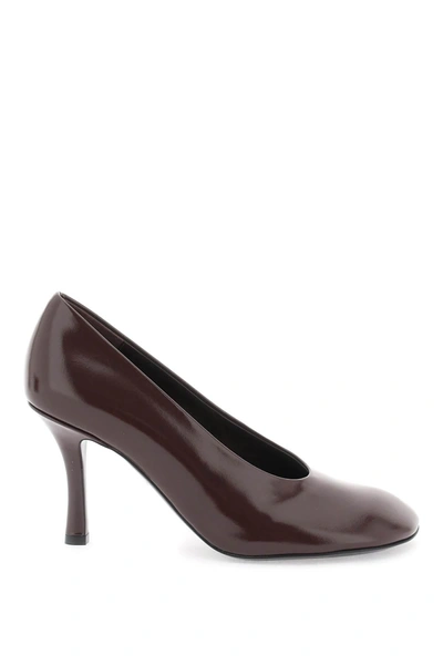 Shop Burberry Glossy Leather Baby Pumps