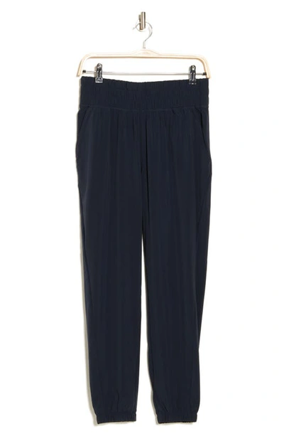 Shop Z By Zella Interval Woven Track Pants In Navy Sapphire
