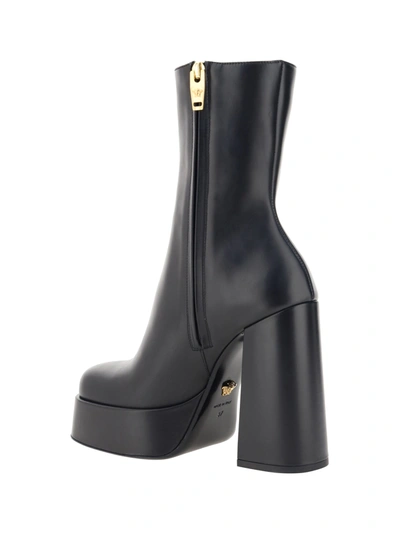Shop Versace Leather Ankle Boots With Plateau