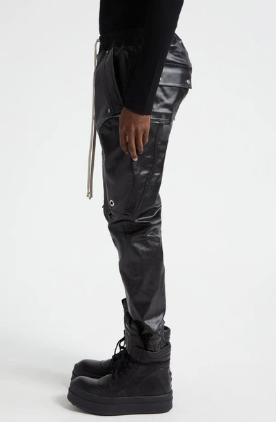 Shop Rick Owens Lido Bauhaus Coated Stretch Denim Cargo Pants In Black