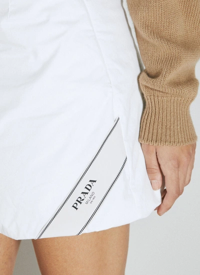 Shop Prada Women Padded Logo Patch Mini Skirt In White