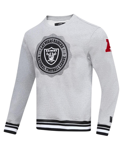 Shop Pro Standard Men's  Heather Gray Las Vegas Raiders Crest Emblem Pullover Sweatshirt