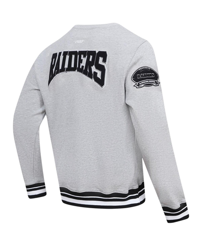 Shop Pro Standard Men's  Heather Gray Las Vegas Raiders Crest Emblem Pullover Sweatshirt