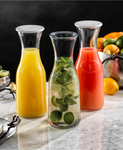 Joyjolt Hali Glass 35 oz Carafe Bottle Pitcher With 8 Lids, Set Of 4 In Clear