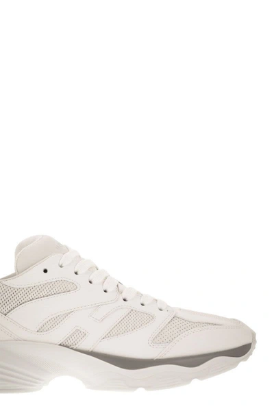 Shop Hogan Sneakers H665 In White