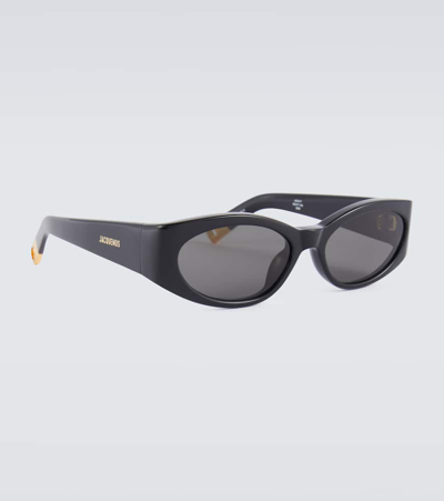 Shop Jacquemus Les Lunettes Ovalo Oval Sunglasses In Black