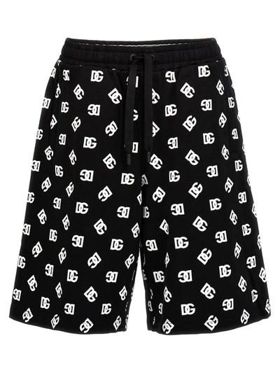 Shop Dolce & Gabbana All Over Logo Bermuda Shorts In White/black