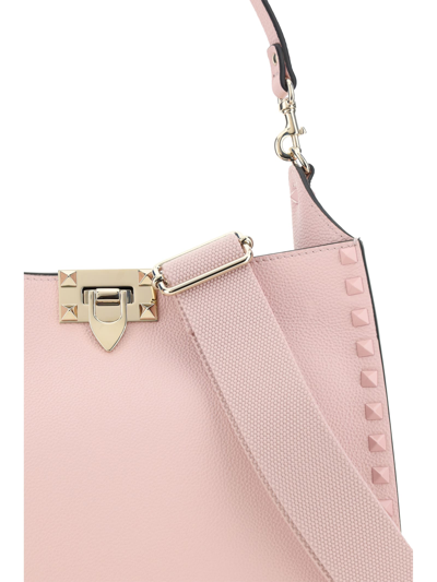 Shop Valentino Garavani Rockstud Shoulder Bag In Rose Quartz
