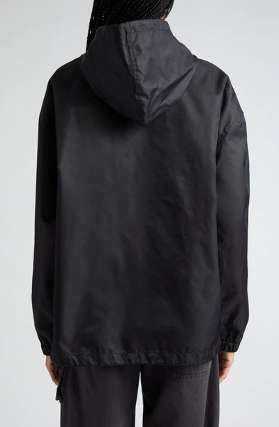 Acne Studios Ovitta Face Patch Hooded Nylon Jacket In Black