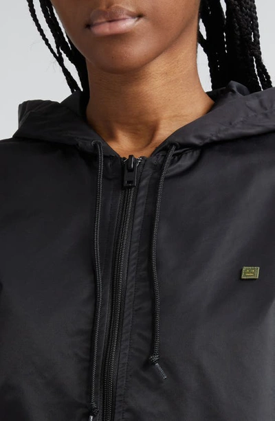Acne Studios Ovitta Face Patch Hooded Nylon Jacket In Black