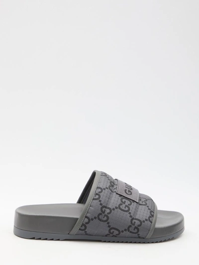 Shop Gucci Slider Sandals With Gg Motif In Grey