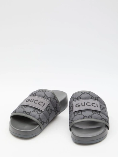 Shop Gucci Slider Sandals With Gg Motif In Grey