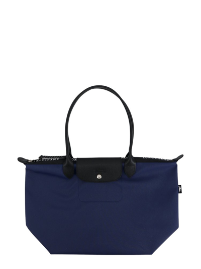 Shop Longchamp Large Le Pliage Energy Top Handle Bag In Blue