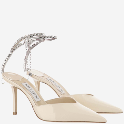 Shop Jimmy Choo Saeda 85mm Patent Leather Pumps In Linen/crystal
