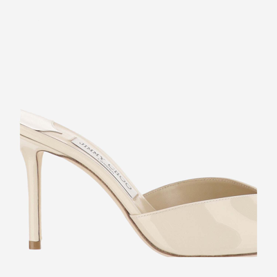 Shop Jimmy Choo Saeda 85mm Patent Leather Pumps In Linen/crystal