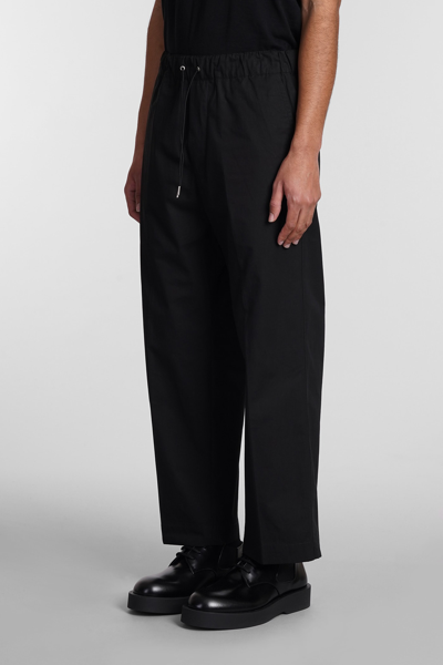 Shop Oamc Pants In Black Cotton