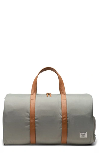 Shop Herschel Supply Co Novel Recycled Duffle Bag In Seagrass/ White Stitch