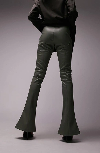 Shop Topshop Slit Hem Faux Leather Flare Pants In Khaki