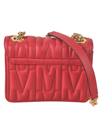 Shop Moschino Quilted Chain Shoulder Bag In 0116