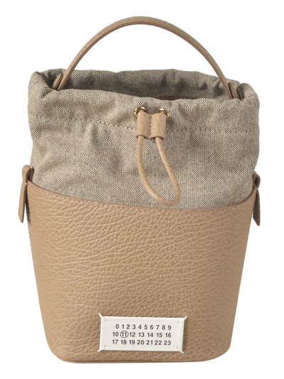 Shop Maison Margiela Logo Patched Bucket Bag In Almond