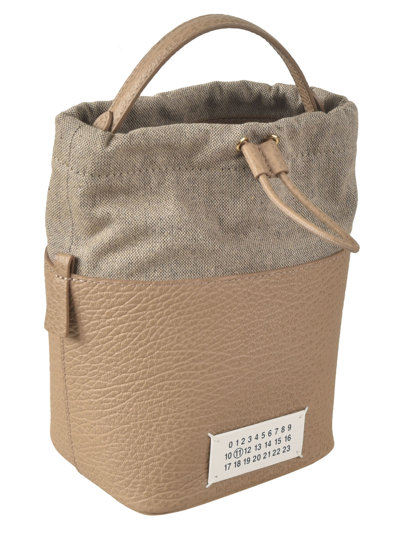Shop Maison Margiela Logo Patched Bucket Bag In Almond