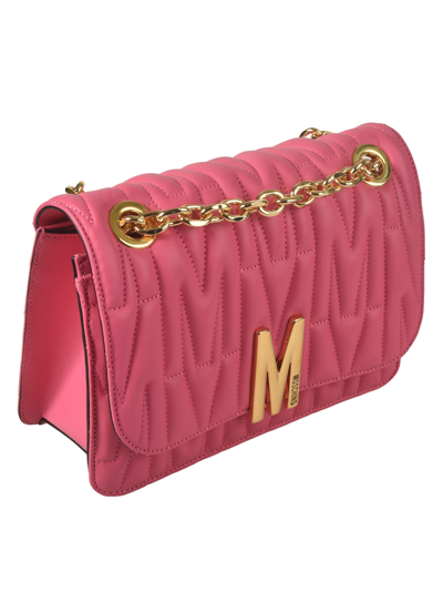 Shop Moschino Logo Quilted Chain Shoulder Bag In 0199