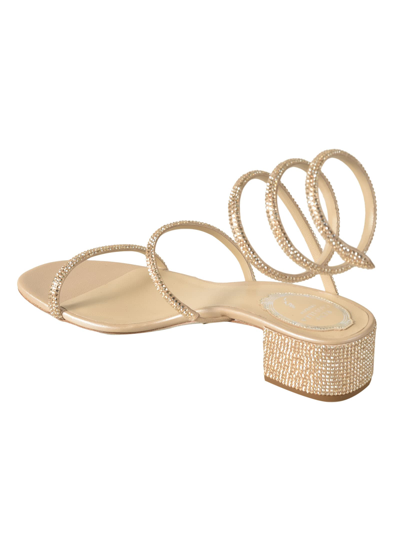 Shop René Caovilla Crystal Embellished Twisted Strap Flat Sandals In Beige