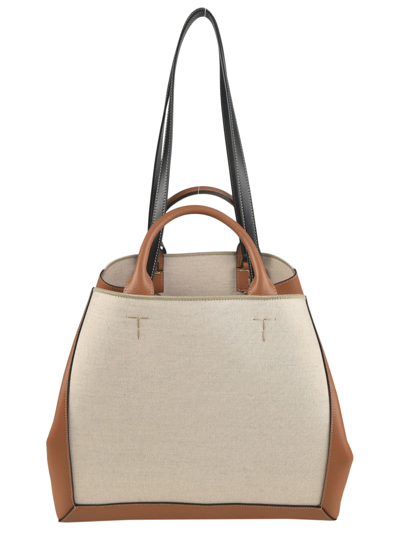 Shop Tod's Logo Embossed Shoulder Bag In Brown