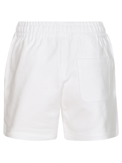 Shop Moschino Logo Bear Shorts In White