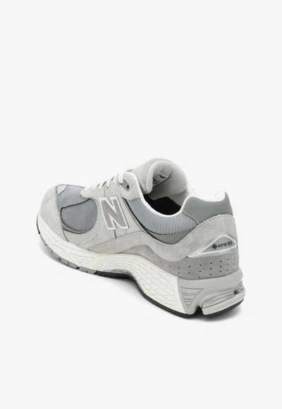 Shop New Balance 2002rx Low-top Sneakers In Suede And Mesh In Gray