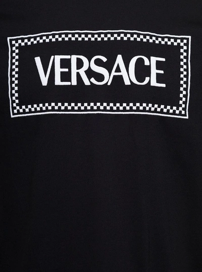 Shop Versace Black Crewneck T-shirt With Contrasting Logo Lettering Print In Cotton Man
