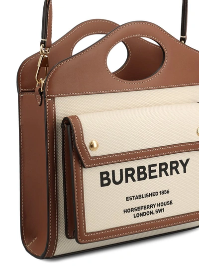 Shop Burberry Handbags In Natural/malt Brown