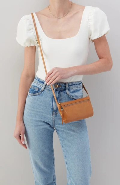 Shop Hobo Cara Leather Crossbody Bag In Natural