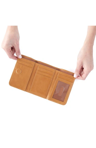 Shop Hobo Jill Leather Trifold Wallet In Natural