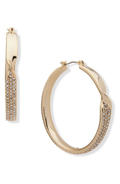 Shop Dkny Pavé Crystal Twisted Hoop Earrings In Gold/ Crystal