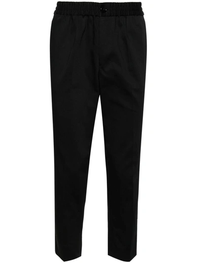 Shop Ami Alexandre Mattiussi Ami Paris Elasticated-waist Cropped Trousers In Noir