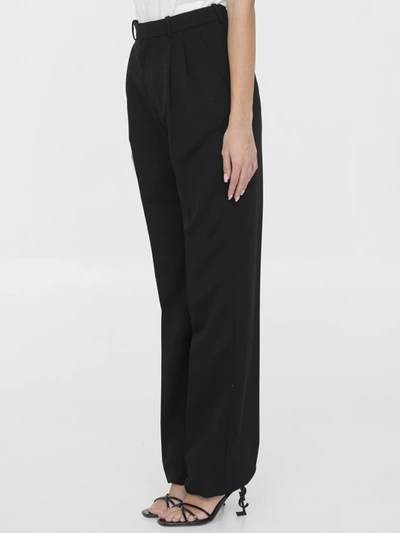 Shop Saint Laurent Grain De Poudre Trousers In Black