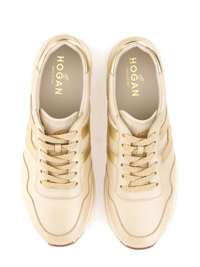 Shop Hogan Sneaker "midi H222" In Gold